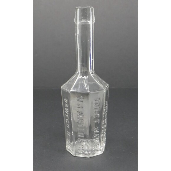 W.J Austen & Co Oriental Toilet Water Oswego NY Embossed Octagon Glass Bottle - Picture 1 of 11
